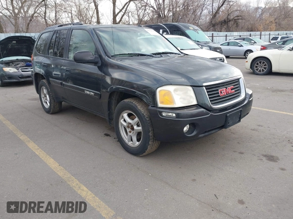 2005 GMC Envoy SLT with VIN 1GKDT13S352258833, listed as a IAAI auction lot 41525149 with 213,829 mi miles. Bid and sale history available at carsss.com. Image 1.