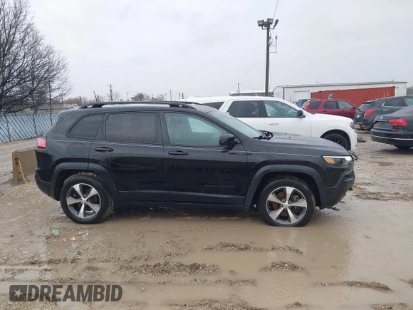 2020 Jeep Cherokee Latitude with VIN 1C4PJMCX9LD584410, listed as a IAAI auction lot 41710754 with 73,325 mi miles. Bid and sale history available at carsss.com. Image 13.