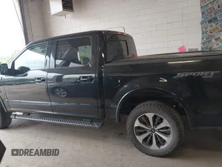 2015 Ford F-150 XLT with VIN 1FTEW1EPXFKE99354, listed as a IAAI auction lot 42245005 with 160,164 mi miles and . Bid and sale history available at DreamBid. Image 14.