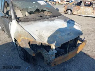 2003 Toyota Corolla CE with VIN 1NXBR32E43Z047677, listed as a IAAI auction lot 41427393 with 299,999 mi miles. Bid and sale history available at carsss.com. Image 6.