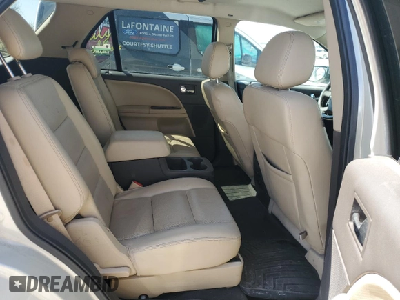2008 Ford Taurus X Limited z VIN 1FMDK06W58GA00078, wystawiony jako Copart lot #52862145 z przebiegiem 163 203 mil mil oraz Czysty tytuł • Clean title. Historia ofert i sprzedaży dostępna na DreamBid. Obrazek 11.