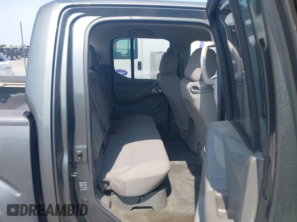 2005 Nissan Frontier LE with VIN 1N6AD07W35C438405, listed as a IAAI auction lot 42469804 with 128,472 mi miles and . Bid and sale history available at DreamBid. Image 8.