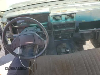 1987 Nissan Hardbody E z VIN JN6ND11S1HW030629, wystawiony jako Copart lot #65657004 z przebiegiem 181 228 mil mil oraz Szkody całkowita. Historia ofert i sprzedaży dostępna na DreamBid. Obrazek 8.