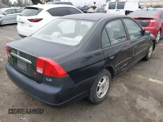 2001 Honda Civic LX with VIN JHMES16571S010117, listed as a IAAI auction lot 42207199 with 194,825 mi miles and . Bid and sale history available at DreamBid. Image 4.