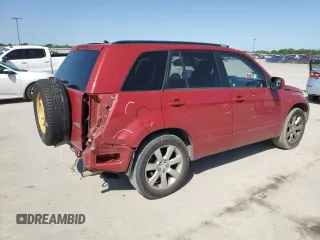 2011 Suzuki Grand Vitara Limited z VIN JS3TE0D72B4100054, wystawiony jako Copart lot #52535705 z przebiegiem 131 468 mil mil oraz Szkoda całkowita • Salvage title. Historia ofert i sprzedaży dostępna na DreamBid. Obrazek 3.