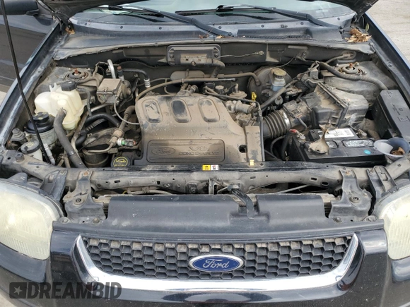 2004 Ford Escape Limited with VIN 1FMCU04134KA61949, listed as a Copart auction lot 47377455 with 205,480 mi miles and Salvage title. Bid and sale history available at DreamBid. Image 12.