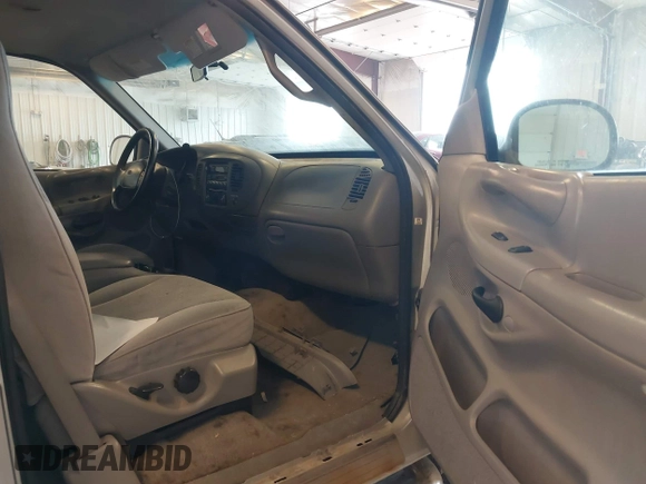 1998 Ford F-150 XL with VIN 2FTRX08L1WCA04612, listed as a IAAI auction lot 42518487 with 173,286 mi miles and . Bid and sale history available at DreamBid. Image 5.