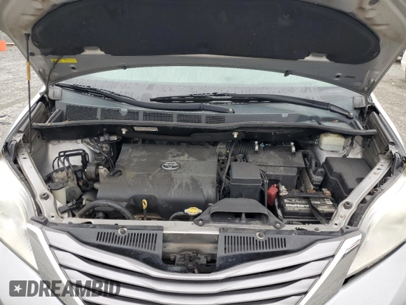 2015 Toyota Sienna XLE с VIN 5TDYK3DC7FS571431, выставлен на аукционе Copart как лот 57173595 с пробегом 305 940 миль миль и Списание • Salvage title. История ставок и продаж доступна на DreamBid. Изображение 12.