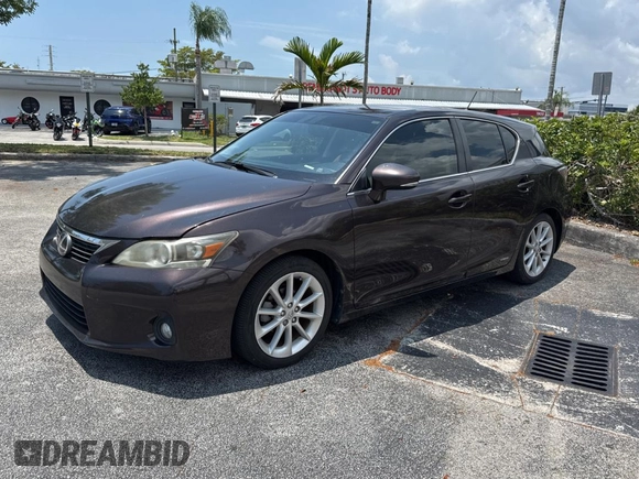 2012 Lexus CT 200h z VIN JTHKD5BH4C2062988, wystawiony jako Copart lot #58529705 z przebiegiem 153 672 mil mil oraz Tytuł czysty. Historia ofert i sprzedaży dostępna na DreamBid. Obrazek 2.