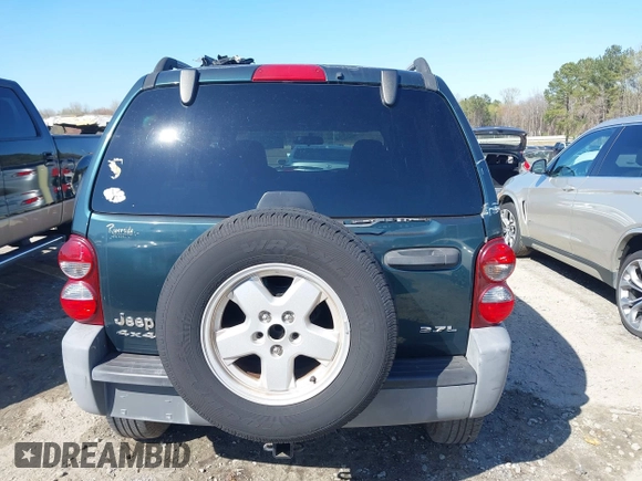 2005 Jeep Liberty Sport with VIN 1J4GL48K05W584675, listed as a IAAI auction lot 41867491 with 112,882 mi miles. Bid and sale history available at carsss.com. Image 16.