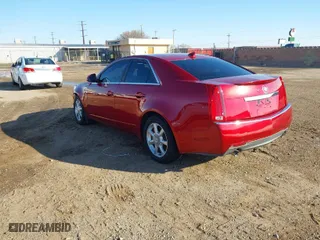 2009 Cadillac CTS AWD w/1SB with VIN 1G6DS57V390159184, listed as a IAAI auction lot 41323423 with 158,980 mi miles. Bid and sale history available at carsss.com. Image 3.