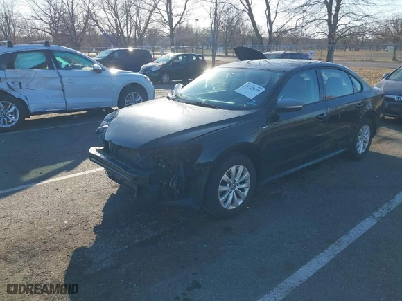 2015 Volkswagen Passat 1.8T Wolfsburg Ed with VIN 1VWAT7A34FC004649, listed as a IAAI auction lot 41728398 with 91,651 mi miles. Bid and sale history available at carsss.com. Image 2.