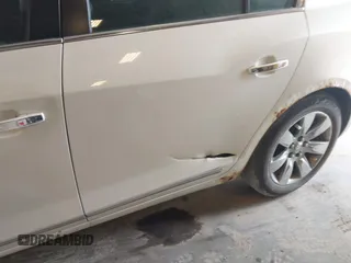 2012 Buick LaCrosse Premium 3 z VIN 1G4GH5E33CF147711, wystawiony jako IAAI lot #42572249 z przebiegiem Nie podano mil oraz . Historia ofert i sprzedaży dostępna na DreamBid. Obrazek 11.