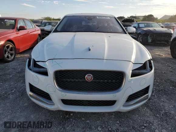 2016 Jaguar XF 35t Prestige with VIN SAJBE4BV3GCY09156, listed as a Copart auction lot 82657394 with 43,171 mi miles and Salvage Title. Bid and sale history available at carsss.com. Image 5.