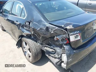 2009 Acura TSX z VIN JH4CU26659C031876, wystawiony jako IAAI lot #42339016 z przebiegiem 137 557 mil mil oraz . Historia ofert i sprzedaży dostępna na DreamBid. Obrazek 6.