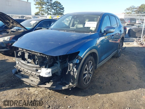 2018 Mazda CX-5 Grand Touring with VIN JM3KFADM9J1328501, listed as a IAAI auction lot 41408154 with 116,679 mi miles. Bid and sale history available at carsss.com. Image 18.