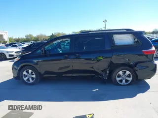 2016 Toyota Sienna LE AAS with VIN 5TDKK3DC1GS697730, listed as a IAAI auction lot 41727769 with 135,469 mi miles. Bid and sale history available at carsss.com. Image 14.