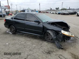 2001 Honda Accord LX z VIN 1HGCG665X1A058192, wystawiony jako Copart lot #57975215 z przebiegiem Nie podano mil oraz Szkoda całkowita • Salvage title. Historia ofert i sprzedaży dostępna na DreamBid. Obrazek 4.
