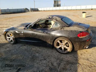 2011 BMW Z4 sDrive35i with VIN WBALM7C5XBE383093, listed as a Copart auction lot 74487034 with 0 mi miles and Salvage Title. Bid and sale history available at carsss.com. Image 2.