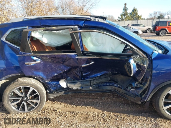2017 Nissan Rogue SV with VIN 5N1AT2MV5HC858874, listed as a IAAI auction lot 41860634 with Not Provided miles. Bid and sale history available at carsss.com. Image 13.