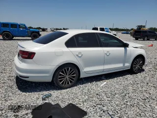 2016 Volkswagen Jetta Sport z VIN 3VWD17AJ8GM331542, wystawiony jako Copart lot #56717875 z przebiegiem 95 780 mil mil oraz Nie do naprawy • Non repairable. Historia ofert i sprzedaży dostępna na DreamBid. Obrazek 3.