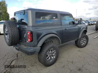 2023 Ford Bronco with VIN 1FMDE5CP1PLA92944, listed as a Copart auction lot 66625304 with 115,179 mi miles and Salvage title. Bid and sale history available at DreamBid. Image 3.