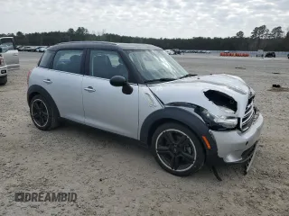 2016 MINI Countryman with VIN WMWZB3C50GWR48610, listed as a Copart auction lot 44028035 with 69,801 mi miles and Salvage title. Bid and sale history available at DreamBid. Image 4.