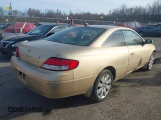 2000 Toyota Solara SE with VIN 2T1CG22P7YC303938, listed as a IAAI auction lot 41770102 with 163,137 mi miles. Bid and sale history available at carsss.com. Image 4.