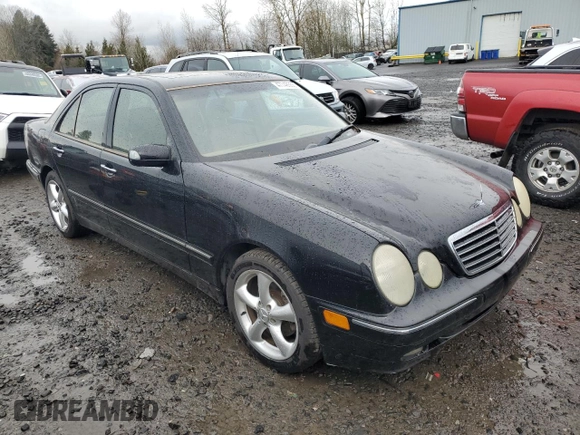 2001 Mercedes-Benz E-Class with VIN WDBJF70J31B324620, listed as a Copart auction lot 47748555 with 160,041 mi miles and Salvage Title. Bid and sale history available at carsss.com. Image 4.