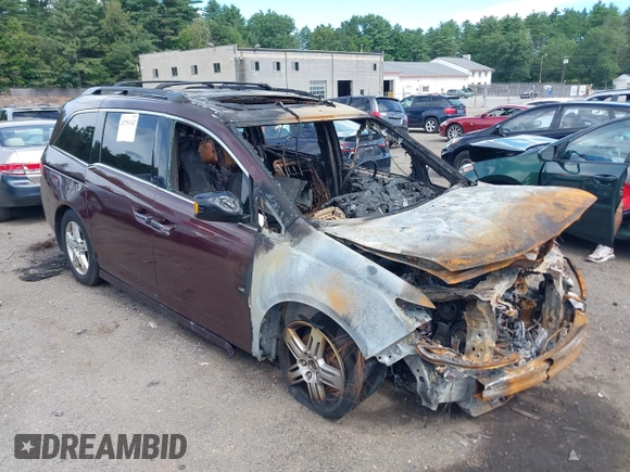 2012 Honda Odyssey Touring z VIN 5FNRL5H95CB040384, wystawiony jako IAAI lot #42751342 z przebiegiem 176 222 mil mil oraz . Historia ofert i sprzedaży dostępna na DreamBid. Obrazek 1.
