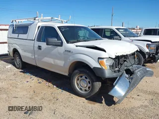 2012 Ford F-150 XL with VIN 1FTMF1CM9CKD33309, listed as a IAAI auction lot 41427178 with 125,029 mi miles. Bid and sale history available at carsss.com. Image 1.