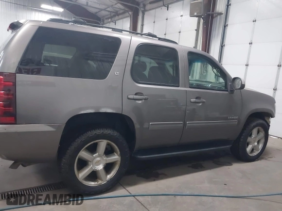 2011 Chevrolet Tahoe LT with VIN 1GNSKBE03BR268246, listed as a IAAI auction lot 41434862 with 250,991 mi miles and . Bid and sale history available at DreamBid. Image 14.