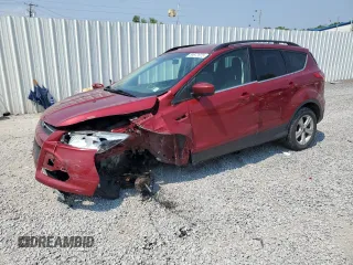 2016 Ford Escape SE с VIN 1FMCU9GX5GUB28001, выставлен на аукционе Copart как лот 59672075 с пробегом 74 295 миль миль и Списание • Salvage title. История ставок и продаж доступна на DreamBid. Изображение 1.