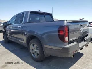2022 Honda Ridgeline RTL-E with VIN 5FPYK3F73NB039135, listed as a Copart auction lot 60512115 with 27,348 mi miles and Salvage title. Bid and sale history available at DreamBid. Image 2.