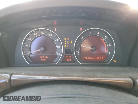 2007 BMW 7 Series 750i with VIN WBAHL83507DT07958, listed as a Copart auction lot 73318944 with 127,698 mi miles and Salvage Title. Bid and sale history available at DreamBid. Image 9.