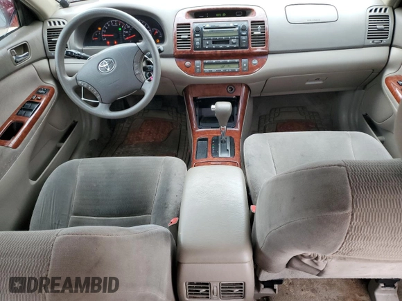 2005 Toyota Camry LE with VIN 4T1BE30KX5U086586, listed as a Copart auction lot 60291715 with 180,421 mi miles and Salvage title. Bid and sale history available at DreamBid. Image 8.
