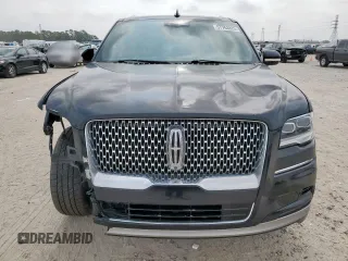 2022 Lincoln Navigator Reserve z VIN 5LMJJ2LT9NEL01131, wystawiony jako Copart lot #57763825 z przebiegiem 107 462 mil mil oraz Szkoda całkowita • Salvage title. Historia ofert i sprzedaży dostępna na DreamBid. Obrazek 5.