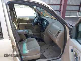2002 Mazda Tribute LX with VIN 4F2YU08132KM26681, listed as a IAAI auction lot 42032230 with 273,155 mi miles and . Bid and sale history available at DreamBid. Image 5.