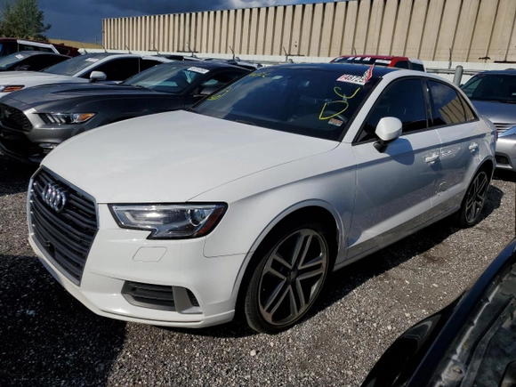 2018 Audi A3 Sedan Premium with VIN WAUAUGFF9J1072482, listed as a Copart auction lot 48725203 with 56,985 mi miles. Bid and sale history available at carsss.com. Image 1.