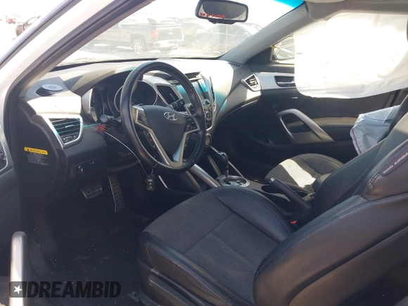 2014 Hyundai Veloster RE:FLEX with VIN KMHTC6AD7EU214911, listed as a IAAI auction lot 42617066 with 115,521 mi miles and . Bid and sale history available at DreamBid. Image 5.