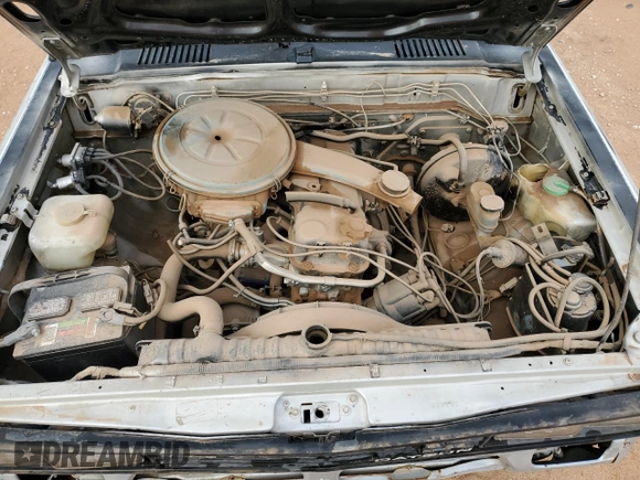 1982 Datsun 720 z VIN JN6MD06S6CW100827, wystawiony jako Copart lot #80042334 z przebiegiem 141 251 mil mil oraz Tytuł czysty. Historia ofert i sprzedaży dostępna na DreamBid. Obrazek 11.