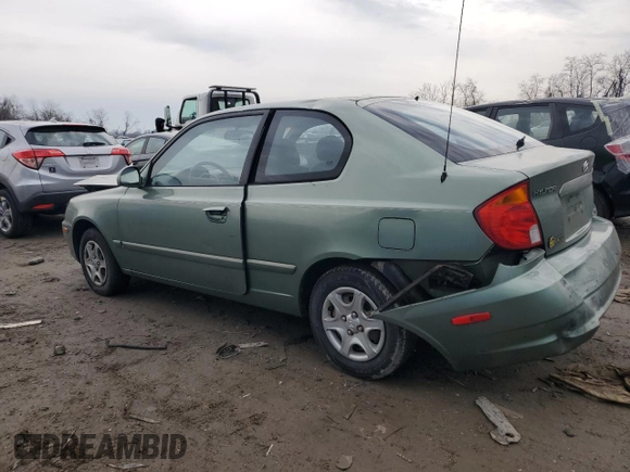 2003 Hyundai Accent GL with VIN KMHCG35C43U236043, listed as a Copart auction lot 87675835 with 76,232 mi miles and Salvage Title. Bid and sale history available at carsss.com. Image 2.