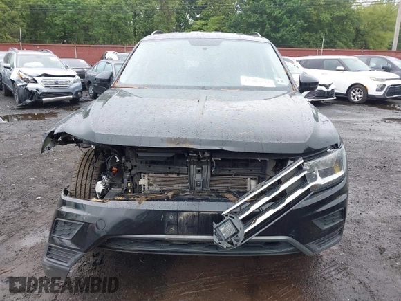 2021 Volkswagen Tiguan S z VIN 3VV0B7AX3MM031908, wystawiony jako IAAI lot #42504384 z przebiegiem 42 510 mil mil oraz . Historia ofert i sprzedaży dostępna na DreamBid. Obrazek 12.