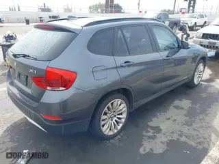 2013 BMW X1 28i with VIN WBAVM1C55DVW41609, listed as a IAAI auction lot 41604038 with 126,036 mi miles. Bid and sale history available at carsss.com. Image 4.