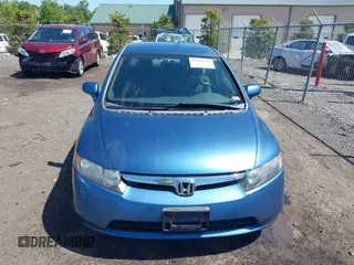 2006 Honda Civic LX with VIN JHMFA16586S000128, listed as a IAAI auction lot 42138350 with 127,253 mi miles and . Bid and sale history available at DreamBid. Image 12.