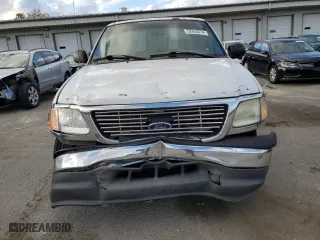 2003 Ford F-150 XL with VIN 1FTRX07243KA29505, listed as a Copart auction lot 79263674 with 188,516 mi miles and Salvage Title. Bid and sale history available at carsss.com. Image 5.