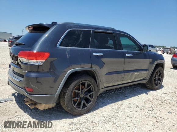 2014 Jeep Grand Cherokee Limited with VIN 1C4RJEBT9EC274120, listed as a Copart auction lot 54722064 with 148,684 mi miles and Salvage Title. Bid and sale history available at DreamBid. Image 3.