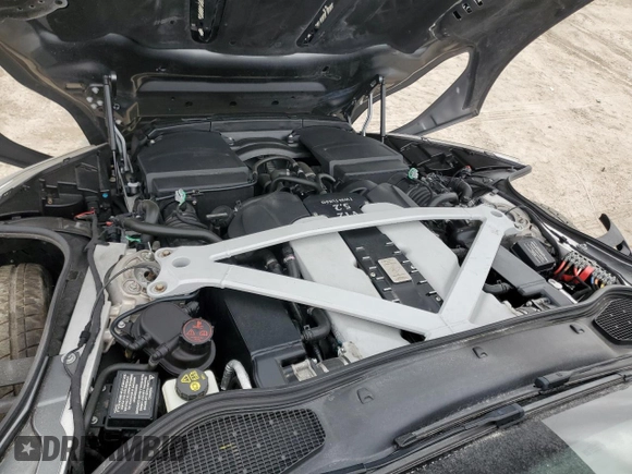 2017 Aston Martin DB11 z VIN SCFRMFAV2HGL00765, wystawiony jako Copart lot #87010474 z przebiegiem Nie podano mil oraz Nie do naprawy. Historia ofert i sprzedaży dostępna na DreamBid. Obrazek 11.