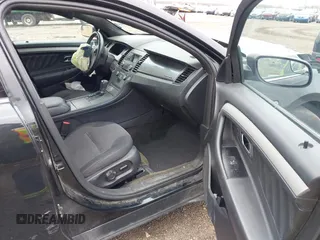 2014 Ford Taurus SEL with VIN 1FAHP2E80EG114996, listed as a IAAI auction lot 41908983 with 136,864 mi miles. Bid and sale history available at carsss.com. Image 5.