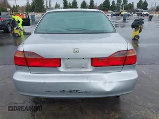1999 Honda Accord LX z VIN 1HGCG5645XA023392, wystawiony jako IAAI lot #41525751 z przebiegiem 214 850 mil mil oraz . Historia ofert i sprzedaży dostępna na DreamBid. Obrazek 16.